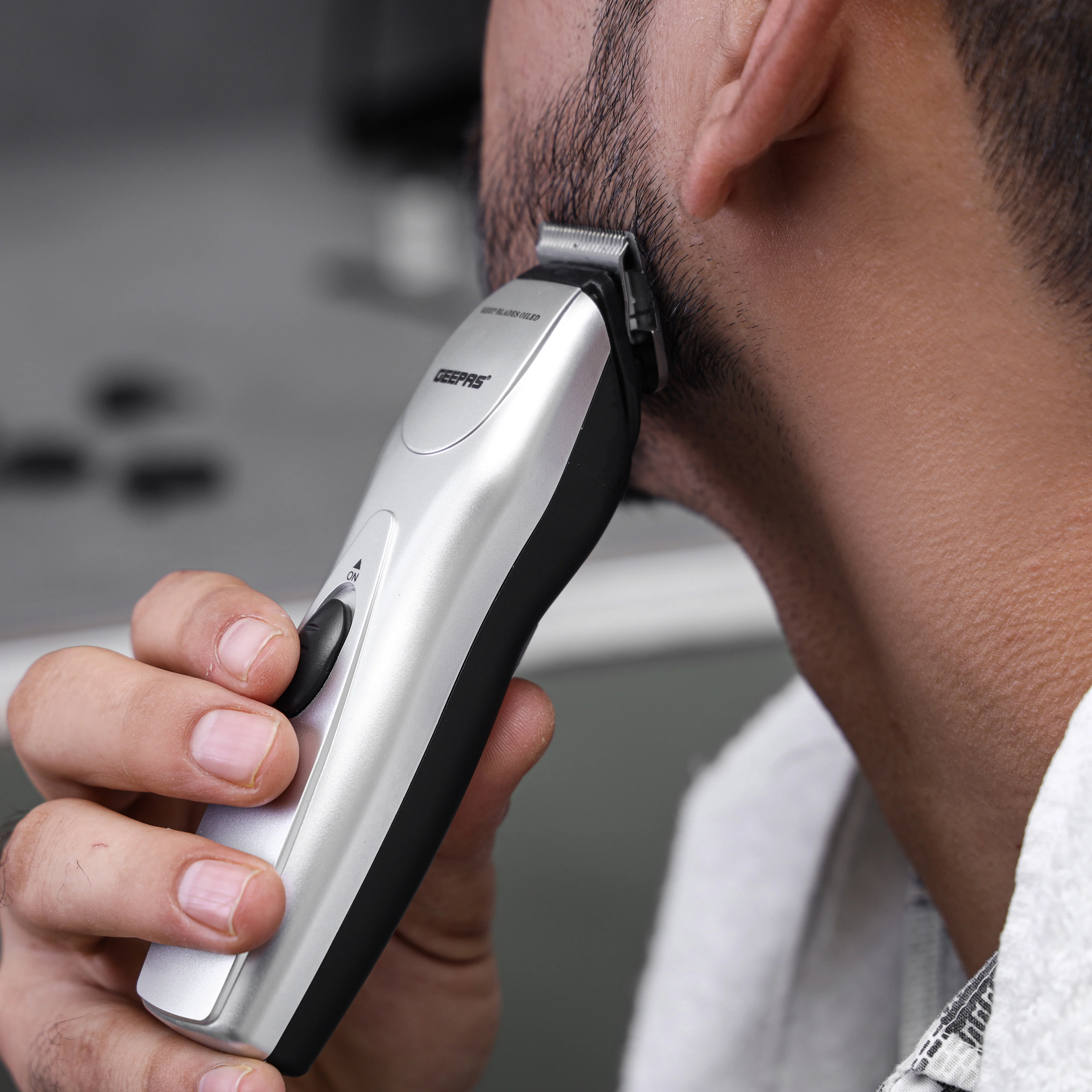 Geepas GTR34N Rechargeable Hair Trimmer| Chromium Steel Blade, 5 Position Comb & 60-Min Working Time| Durable Design, Ergonomic Grip, Jawline & Moustache Combs| - Image 5