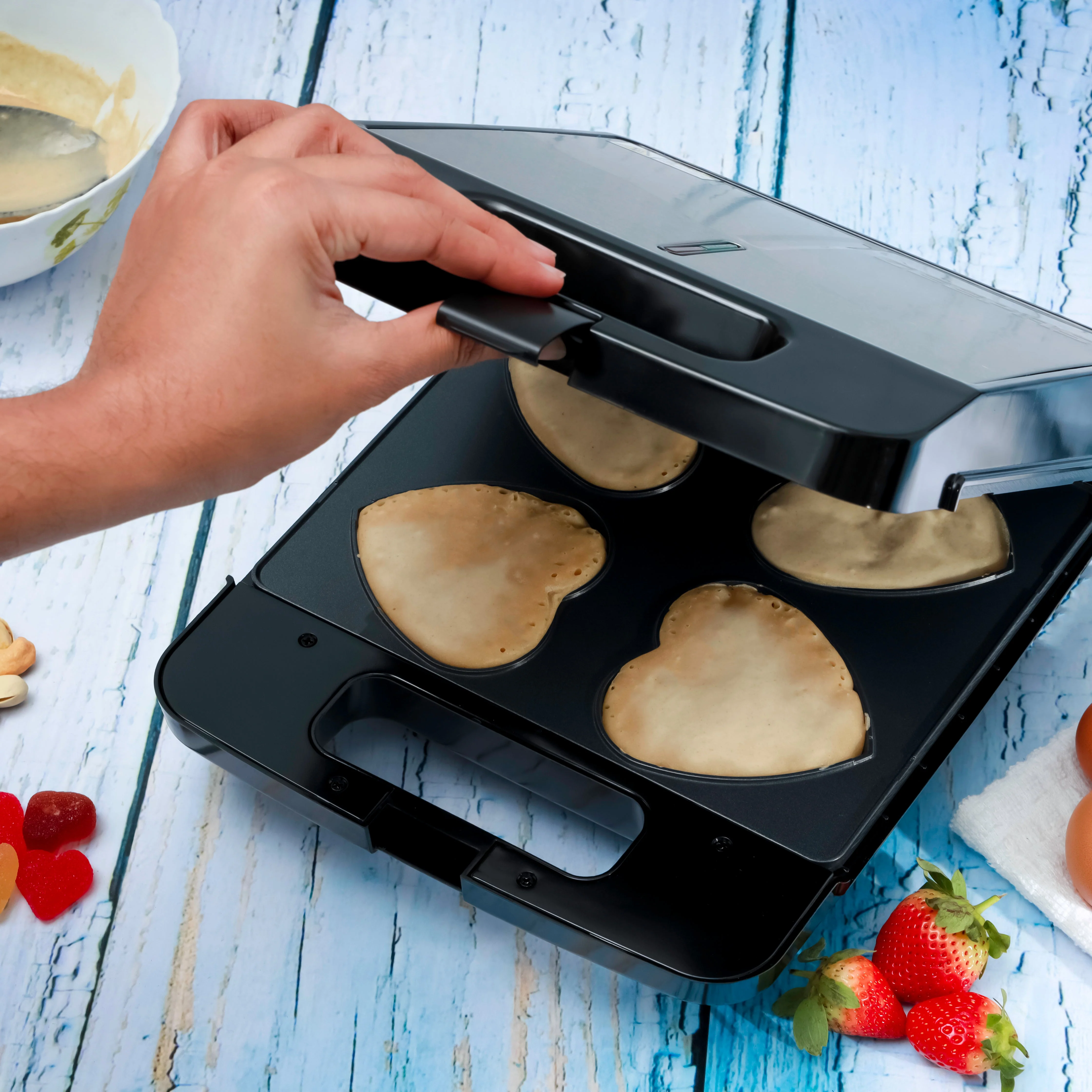 Geepas GWM36543 Heart Waffle Maker| 4 Slice Non-Stick Waffle Plate, Durable Build & 1400W Power| Cool Touch Housing, Easy to Clean Design & Overheat Protection| - Image 3