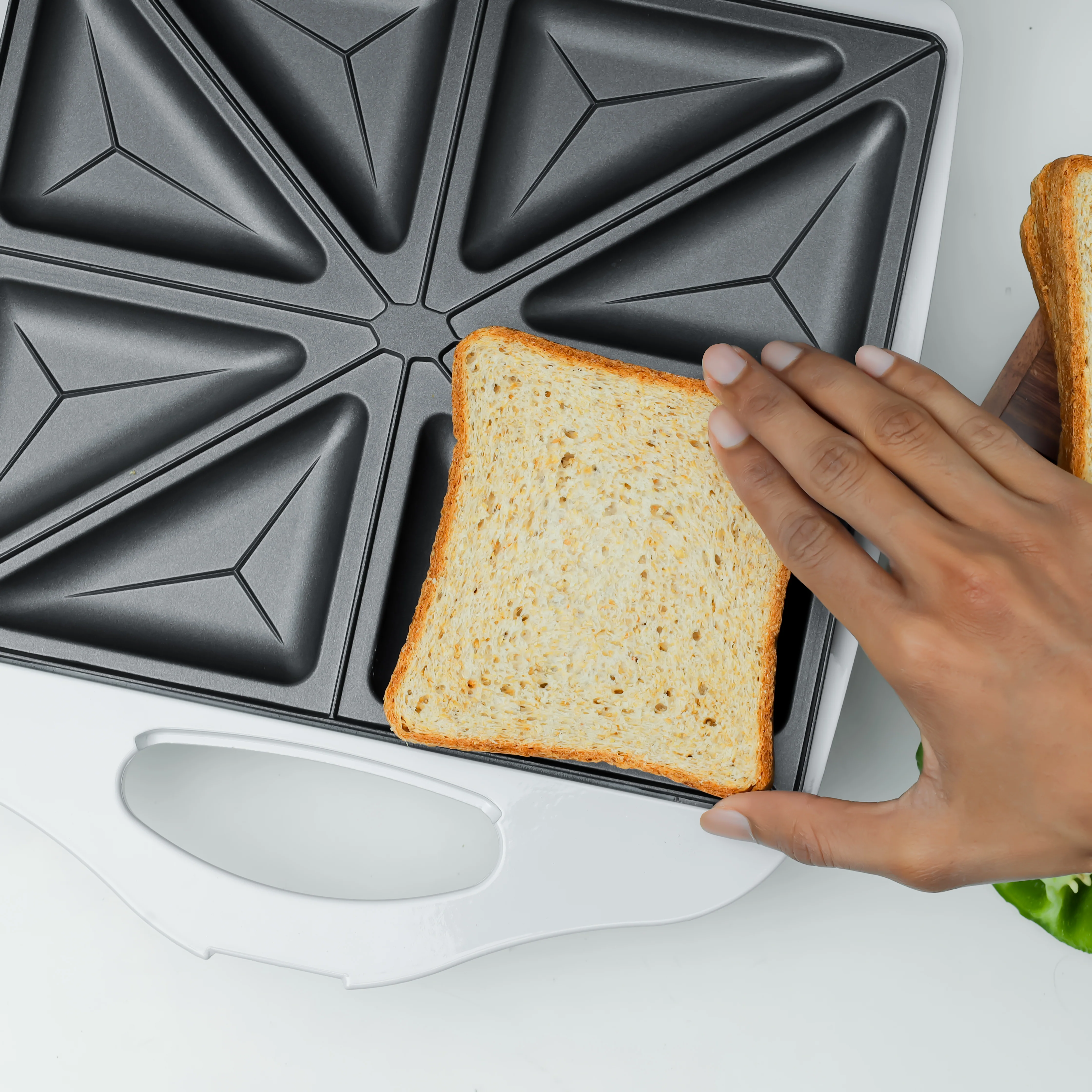 Olsenmark OMGM2113J 4 Slice Sandwich Maker 1400W| non-stick plates, cool-touch handle & lock system power| indicator lights, upright storage & auto temp control| - Image 4